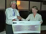 Rotarian Diane Clarke presents a cheque for �2000 to Carl Undery of the Thames Valley and Chiltern Air Ambulance Trust