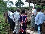 Andrew Bartholomew talking to a group of villagers in Mubende
